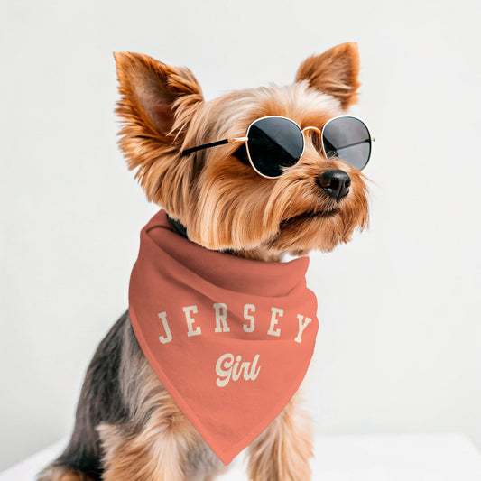 Dog wearing sunglasses and a 'Jersey Girl' bandana